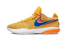 the nike zoom flyknit is an orange, blue and yellow sneaker