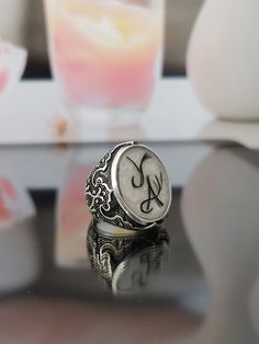 "✓ Personalized Hair Locket Heart Ring For Unisex. Our Solid 925 Sterling Silver ring with; %100 hand crafted, gold workmanship is specially produced for you, Jewelry made with love for your special occasions. ---● R I N G ∙ D E T A I L S ●--- * The Case Of The Ring is SOLID 925 STERLING SILVER. * The upper part of the ring is made of UV stable resin. And your hair will be safe in it. * We create letters/designs by hand crafted by separating your hair into strands. * The shapes of the letters/de White Engraved Initial Ring, Handmade White Signet Ring, Handmade Engraved White Gold Ring, Handmade White Engraved Ring As A Gift, Handmade White Engraved Ring For Gift, Hair Locket, Ring Cat, Hair Keepsake, Horse Hair Jewelry