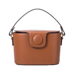 An update to a classic box bag Adelynn features soft rounded edges crafted from premium vegan leather and customizable carry options. Remove the snap handle and change it into a crossbody by using the included adjustable strap. Features a secure top zipper, an inner zippered pocket to keep your belongings secure. By Melie Bianco Brown Rectangular Box Bag With Carry Handle, Chic Rectangular Saddle Bag With Detachable Handle, Trendy Brown Rectangular Box Bag, Versatile Rectangular Brown Box Bag, Versatile Rectangular Saddle Bag, Modern Faux Leather Box Bag, Evening Brown Box Bag With Adjustable Strap, Chic Rectangular Saddle Bag, Trendy Formal Crossbody Saddle Bag