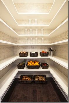 an empty pantry filled with lots of different types of fruits and veggies on shelves