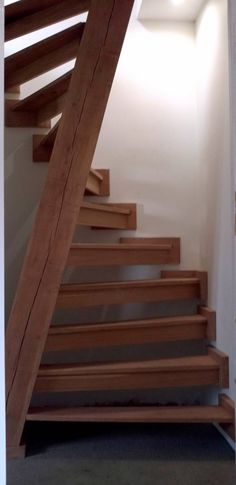 the stairs are made of wood and have no railings