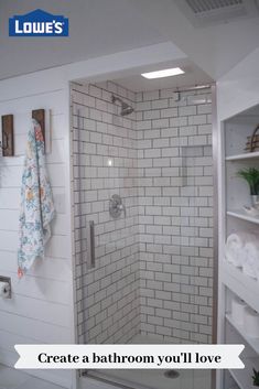 a bathroom with white walls and flooring has a walk in shower next to the toilet