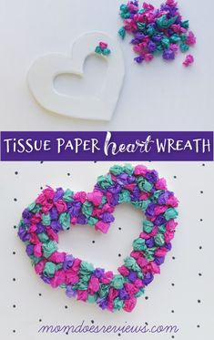 tissue paper heart wreath is shown with the words tissue paper heart written in purple and green