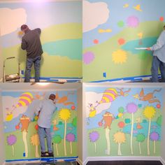 two men are painting the walls in different stages of being decorated with colorful trees and clouds