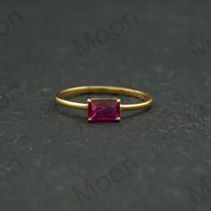 Baguette Birthstone Ring, Ruby Ring, 14K Gold Ring, Personalized Ring, Stackable Ring, Mothers Ring, Bridesmaid Gift, Dainty Minimalist Ring ◈ Item Details ◈ Metal: 925 Sterling Silver   Style: Gemstone Ring Main Stone: Ruby Main Stone Color: Red Main Stone Shape: Baguette ABOUT GEMSTONE - ♥ Purification ♥ Serenity ♥ Protection ♥ Wisdom ♥ Balance ♥ Strength ♥ Friendship ♥ Love ♥ Positive thinking ♥ Sensitivity S I L V E R J E W E L R Y C A R E Silver is not the best friend of oxygen and sulfur; it can be oxidized and tarnished from time to time it is the nature of silver. To keep the silver shiny and prevent it from oxidizing fast, we would recommend the following instructions; * Avoid any chemical agents including perfume, makeup, and hair spray. * Avoid wearing silver jewelry to the beac Rubin Ring, Mothers Ring, Ring Ruby, Mother Rings, Fancy Gifts, Personalized Ring, Minimalist Ring, Personalized Rings, Stackable Ring