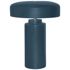 a blue table lamp sitting on top of a white floor