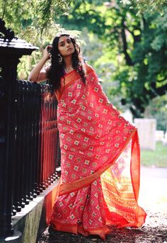 Double Ikkat silk saree known for it's unique style and weave. This Ikkat saree has multi colored diamond design on a red and orange base. Saree Blouse Patterns, Designer Saree Blouse Patterns, Ikkat Saree, Ikkat Silk Sarees