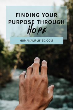 someone holding their hand up with the words finding your purpose through hope in front of them