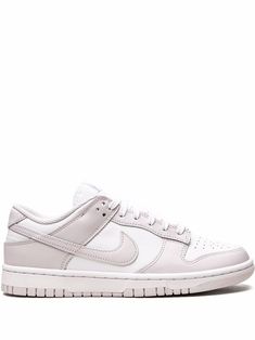 White leather Dunk Low sneakers from NIKE featuring signature Swoosh logo detail, embroidered logo to the rear, round toe, front lace-up fastening, logo patch at the tongue, branded insole and rubber sole. These styles are supplied by a premium sneaker marketplace. Stocking only the most sought-after footwear, they source and curate some of the most hard to find sneakers from around the world.. | Nike Dunk Low sneakers Nike Dunks Neutral, Vanilla Girl Shoes, Stockx Sneaker, Dunk Low Venice, Stockholm Shoes, Nike Dunks Low, Nike Tenis, Shopping Aesthetic, Sneaker Lovers