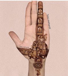 a person's hand with hendi on it