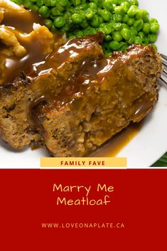 meatloaf with gravy, peas and mashed potatoes on a plate