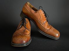 "Stunning vintage 1970s gentlemen's brogue shoes with lovely detailing throughout. These shoes are in good vintage pre-loved condition. They are stamped size 7 1/2 D. The leather body is lined inside with a cotton grosgrain fabric. I wear a ladies' size 40 euro or 9-10 us; these shoes fit me quite well. -10 1/2\" long inside toe to heel -3 1/2\" wide P.S. Follow me on Instagram @oshawa66vintage, I'm always adding new stuff!😊" Shoes 80s, 70s Shoes, Brogue Shoe, 80s Shoes, Brogues Men, Gentleman Shoes, Shoes Classic, Shoes Vintage, Brogue Shoes