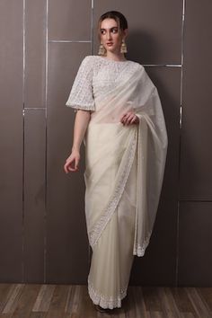 Off-white chinon saree with floral, thread and sequins hand embroidery. Comes with a padded blouse. - Aza Fashions White Fitted Pre-draped Saree For Eid, White Pre-draped Saree With Sheer Dupatta For Eid, White Tissue Silk Pre-draped Saree With Unstitched Blouse, White Unstitched Organza Blouse Piece, Designer White Organza Blouse, White Organza Pre-draped Saree For Diwali, White Georgette Blouse With Resham Embroidery, White Anarkali Blouse With Sheer Dupatta, White Georgette Blouse For Eid