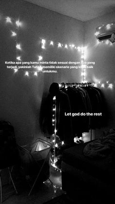 black and white photograph of bedroom with lights on the wall above bed, and quote written in upper right corner