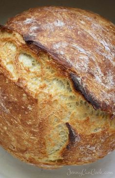 a loaf of bread sitting on top of a white plate