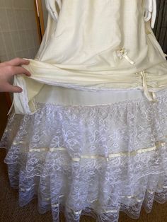 "Amazing! 1980's light yellow and white lace and floral full hoop skirt dress! Very light, cotton poly material, single layer. Has visible stains, but faint from a distance. Total beauty and the beast look! Bust: 34\" Waist: 26\" Hips free Waist to hem: 45\"" Cream Tiered Skirt Dress With Lace Trim, White Marie Antoinette Dress For Debutante Ball, White Vintage Crinoline Petticoat, Fitted White Dress In Crinoline, White Victorian Marie Antoinette Dress With Ruffles, Spring Crinoline Dress With Full Skirt, Spring Dress With Full Skirt In Structured Fabric, Spring White Victorian Costume Dress, White Victorian Dress For Spring Costume