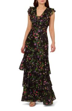 A bloom-splashed print adorns the graceful drape of this delicately charming gown cut in a tiered silhouette. 62" length Hidden back-zip closure Deep V-neck with ties Cap sleeves Lined 100% polyester Dry clean Imported Tiered Floral Print Maxi Dress For Evening, Floral Print Tiered Maxi Dress For Evening, Elegant Floral Print Tiered Maxi Dress, Elegant Floral Print Tiered Skirt Maxi Dress, Elegant Tiered Skirt Maxi Dress With Floral Print, Embroidery Gown, Mothers Dresses, Chiffon Gown, Gowns With Sleeves