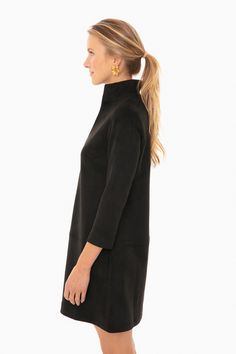 Versatile, on-trend, and classic, the Clifton Dress is a Tuckernuck must have for fall and winter. Featuring a stand collar, v-neck, and three-quarter length sleeves, this will take you from desk to drinks and pairs effortlessly with flats and boots! 

Stand collar
Three-quarter length sleevesFaux suede
V-neck95% polyester, 5% spandexCare: Dry clean prior to the first wear Broad Shoulders, Suede Dress, A Stand, Fall Dresses, Fall And Winter, Stand Collar, Three Quarter, Black Suede, High Neck Dress