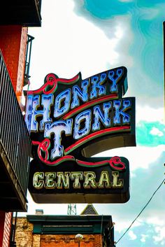 the neon sign for honey honk and central