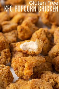 chicken nuggets are piled on top of each other with the words gluten free kfc popcorn chicken