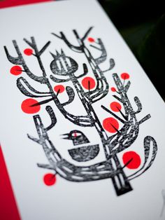 an image of a card with red and black ink on it