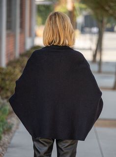 Here is our trendy Black Short Shrug Cardigan With Pockets Made out of a soft brushed black yarn Yarn content: 55% Acrylic, 28% Polyester, 17% Nylon The front has two pockets Has two sleeves Has a fold back collar The back is like a shrug and 1" shorter No front closure Hand wash or dry clean Center back length 24" Black Sweater Coat With Pockets For Cold Weather, Black Sweater With Pockets For Cold Weather, Black Wool Cardigan For Cold Weather, Versatile Black Outerwear For Cold Weather, Cozy Black Outerwear With Pockets, Cozy Black Wool Outerwear, Black Oversized Versatile Cardigan, Oversized Black Versatile Cardigan, Black Wool Outerwear With Shawl Collar