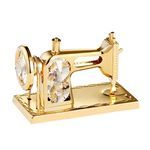 a golden sewing machine on a white background