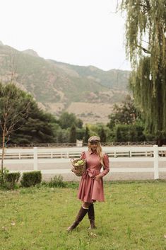 Dress to impress with our Virgo Vegan Leather Dress in Pink! Made with a trendy pink faux leather fabric, this dress features a v-shaped collared neckline, long fitted sleeves, and a knee-length skirt with pockets. With an exposed front zipper and nursing friendly design, it's both stylish and functional. The included belt adds the perfect finishing touch. fall aesthetic, pinterset outfit, fall outfit, family photos, country aesthetic, equestrian, vegan leather dress, mauve leather dress Feminine Pink Mini Dress For Fall, Feminine Knee-length Mini Dress For Fall, Pink Midi Dress For Fall, Aesthetic Equestrian, Country Aesthetic, Fitted Sleeves, Nursing Friendly, Fall Photoshoot, Skirt With Pockets