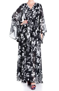 Made from lightweight sheer chiffon, this dress features a pleated surplice-front bodice gathered at an elasticized empire waist, wide sleeves and a sweeping maxi skirt for added drama. 56" length (size Small) Slips on over head V-neck Long sleeves Partially lined 100% polyester with 100% rayon lining Dry clean Imported Dahlia Black, Sunset Dress, Flattering Maxi Dress, Floral Chiffon Maxi Dress, Fashion District, Long Kimono, Medium Dress, Chiffon Maxi, Chiffon Maxi Dress