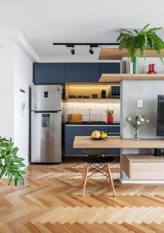 the kitchen is clean and ready to be used as a living room or dining area