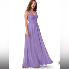 a woman in a long purple dress