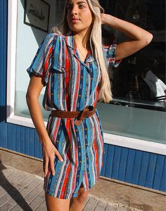 Vintage shirt dress in blue and red print. Collared. Short sleeve dress. Knee length. Two chest pockets. Belt not included. Size M/L, EU 40-46 / UK 12-18 Measurements: 40"/ 102cm bust - 40" / 102cm waist - 42" / 107cm hips - 9" / 23cm sleeve length - 37" / 94cm dress length. Condition - Excellent. Material - Silk. Handpicked, repaired and ready to wear. This is an original vintage item, not new and minor signs of wear & age are expected, we will highlight any major flaws. Model is a UK 6/8 & 5'7" tall. Blue Summer Dress With Rolled Sleeves, Blue Summer Dresses With Rolled Sleeves, Blue Collared Printed Dress, Blue Short Sleeve Shirt Dress With Pockets, Blue Printed Collared Dress, Vintage Shirt Dress, Jumpsuit Skirt, Silk Print Dress, Printed Shirt Dress