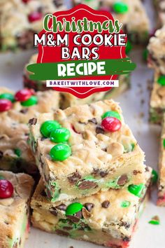 A close-up of two stacked square cookie bars filled with red and green M&Ms surrounded by more cookie bars. Amazing Christmas Desserts, Mnm Cookies, M M Cookie Bars, Cookie Swap Recipes, Brownie Treats, Christmas Cookie Bars, Fried Recipes, Layer Bars, Holiday Baking Recipes