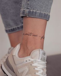 a woman's foot with a small tattoo on her left ankle that reads, i cannott wait