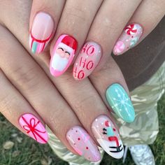 3. Whimsical Pastel Christmas Nails with Santa and Candy Accents Disney Birthday Nails Art Designs, Pastel Holiday Nails, Fun Nails Winter, Festive Christmas Nail Designs, Candyland Christmas Nails, Christmas Nail Art 2024, Christmas Nails Unique, Neon Christmas Nails, Cool Nail Art Designs Unique