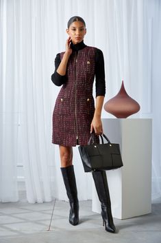 Go all in on the tweed trend in our Italian Tweed Dress. The luxe texture and patina of the weave lend a sophistication to Elie's modern take on the shift dress. Designed with a zipper down the center front & crest button detailing the pockets, this ultra-chic dress is perfect for desk to dinner. Try it layered with our cashmere blend turtleneck for a fresh Fall look. Elie Tahari Exclusive Tweed Shift Dress with Gold Buttons & Zip Front Closure 34% Acrylic, 29% Polyester, 16% Wool, 11% Polyamide Luxury Fall Tweed Dress For Office, Luxury Tweed Dress For Office In Fall, Luxury Tweed Dress For Fall Office Wear, Luxury Tweed Dress For Workwear In Fall, Wool Tweed Knee-length Dress For Work, Knee-length Wool Tweed Dress For Work, Tweed Shift Dress, The Shift, Long Sleeve Short Dress