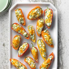 stuffed peppers with cheese and herbs on a plate