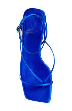 This strappy sandal grounded by a flared heel is a suave and modern addition to any look. 2 3/4" heel (size 8.5) Adjustable ankle strap with buckle closure Leather upper/leather and synthetic lining/synthetic sole Imported