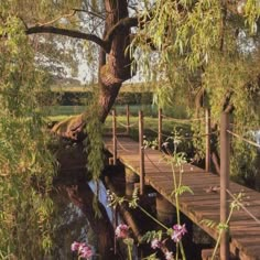 a wooden bridge over a body of water