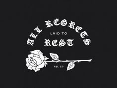 a rose with the words laid to rest written in white on a black background,