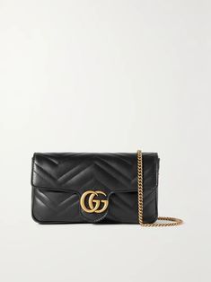 Black GG Marmont 2.0 matelassé leather shoulder bag | GUCCI | NET-A-PORTER Gucci Soft Leather Everyday Shoulder Bag, Everyday Gucci Soft Leather Shoulder Bag, Gucci Soft Leather Everyday Bag, Gucci Soft Leather Bag For Everyday, Black Quilted Gucci Bag, Elegant Gucci Soft Leather Bags, Gucci Luxury Soft Leather Shoulder Bag, Luxury Gucci Shoulder Bag In Soft Leather, Gucci Soft Leather Bag For Formal Occasions