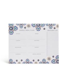 a blue and white floral patterned planner with the words weekly meal plan written on it