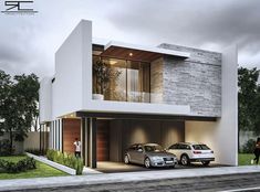 two cars parked in front of a modern house