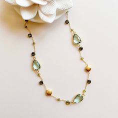 Understated yet elegant and exquisitely handcrafted, our Green Amethyst Gold Bezel Chain necklace features 3 beautiful green amethyst bezel gemstones accented with gold, peridot and forest green peridot quartz stones. Made with 14k gold plated over Italian fine silver, necklace chain is adjustable from 16-18" with a secure spring ring clasp. Gemstone Lariat Necklace, Gold Gemstone Necklace, Silver Necklace Chain, Minimalist Necklace Gold, Bezel Necklace, Amethyst Gold, Gemstone Necklaces, Gemstone Jewelry Handmade, Green Peridot