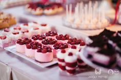 there are many desserts on the table ready to be eaten at this party or celebration