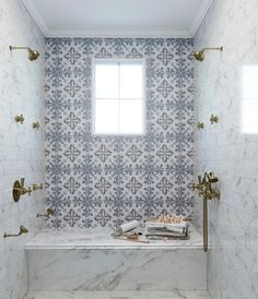 a bath room with a toilet and a window in it's wall next to a tiled floor