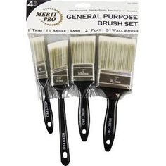 three brushes in plastic packaging with black handles