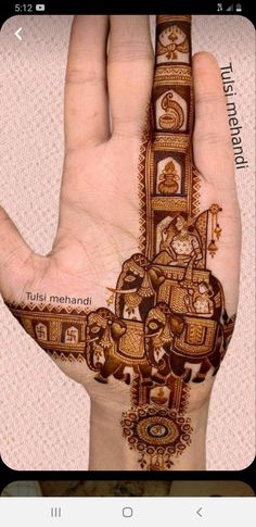 the hand is decorated with an intricate pattern