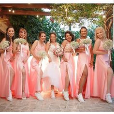 a group of bridesmaids posing for a photo