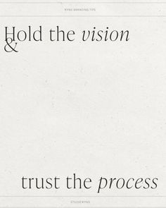 the words hold the vision and trust the process are written in black on white paper